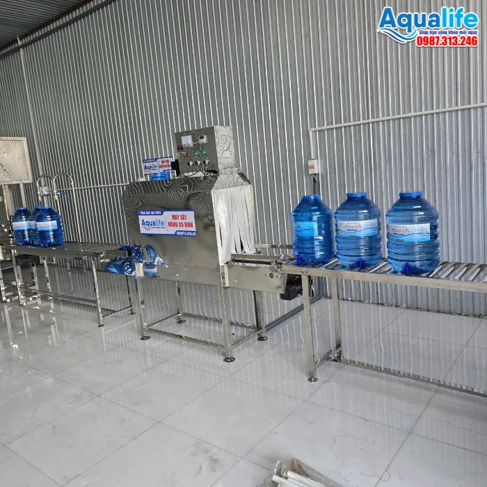 Thiết bị sấy màng co nhiệt cho bình nước đóng bình