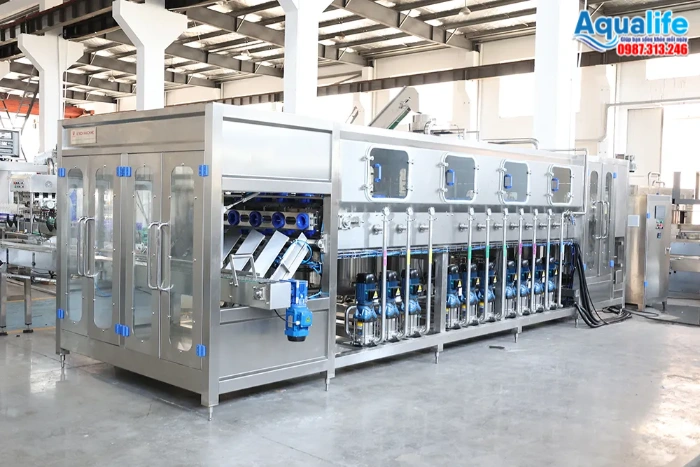 Dây chuyền súc rửa chiết rót và đóng nắp bình 20L tự động inox 304